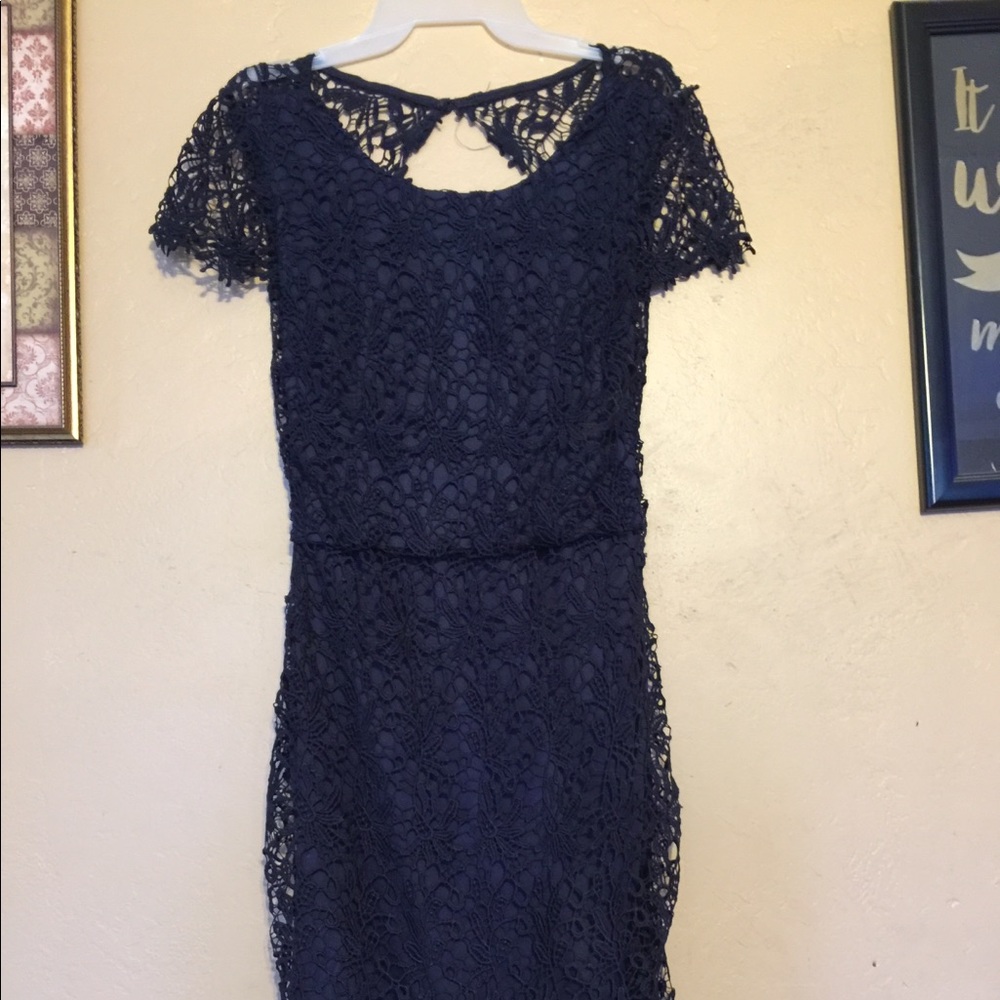 Really cute dark blue dress.